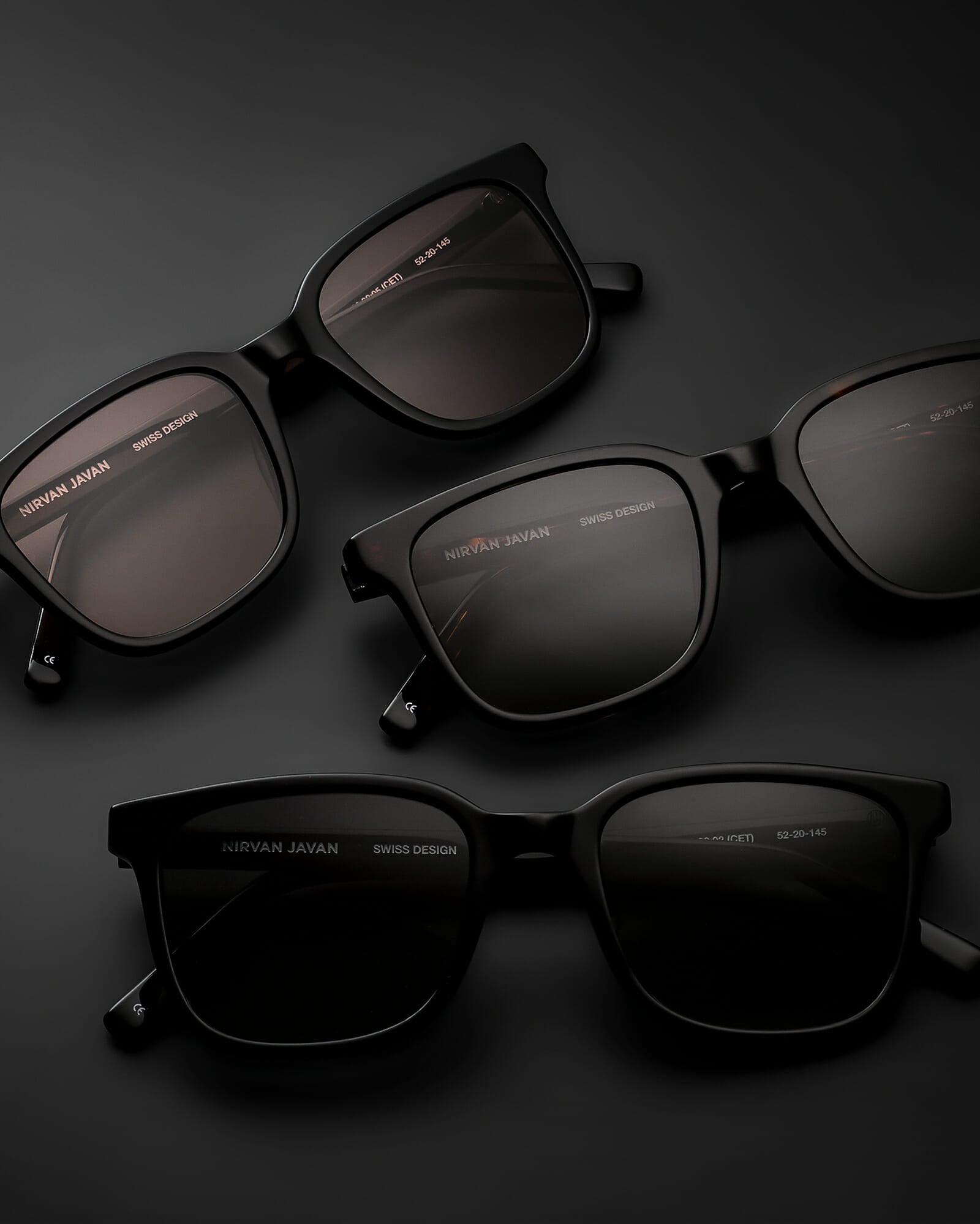 Three acetat shades on a black background, the frames are folded